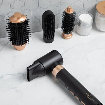 Only August 8-in-1 Hot Air Multi Styler with black and gold attachments for smoothing, curling, and volumizing hair.