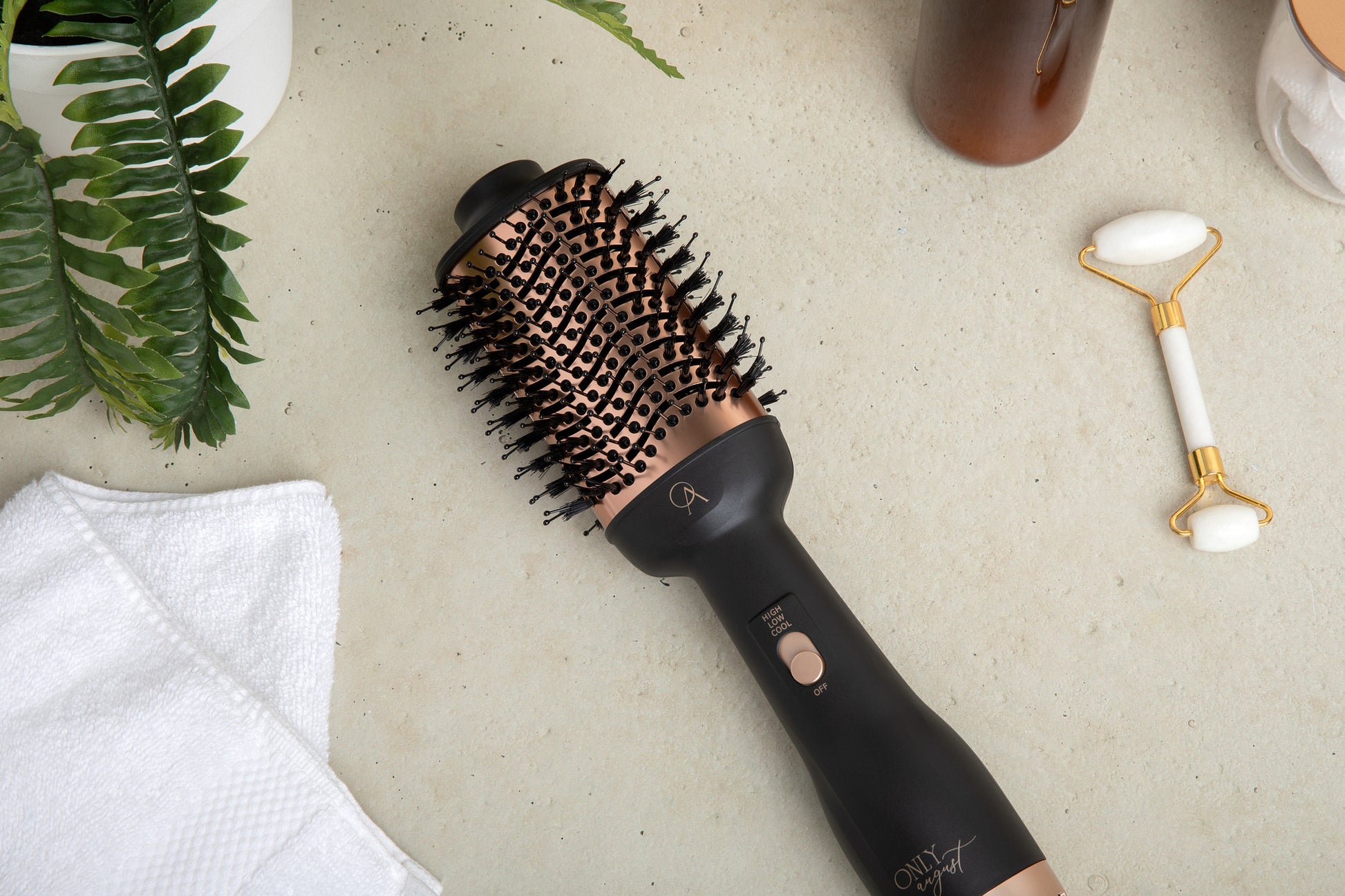 Only August 4-in-1 Hot Air Brush Black and Gold — full styling system flat lay