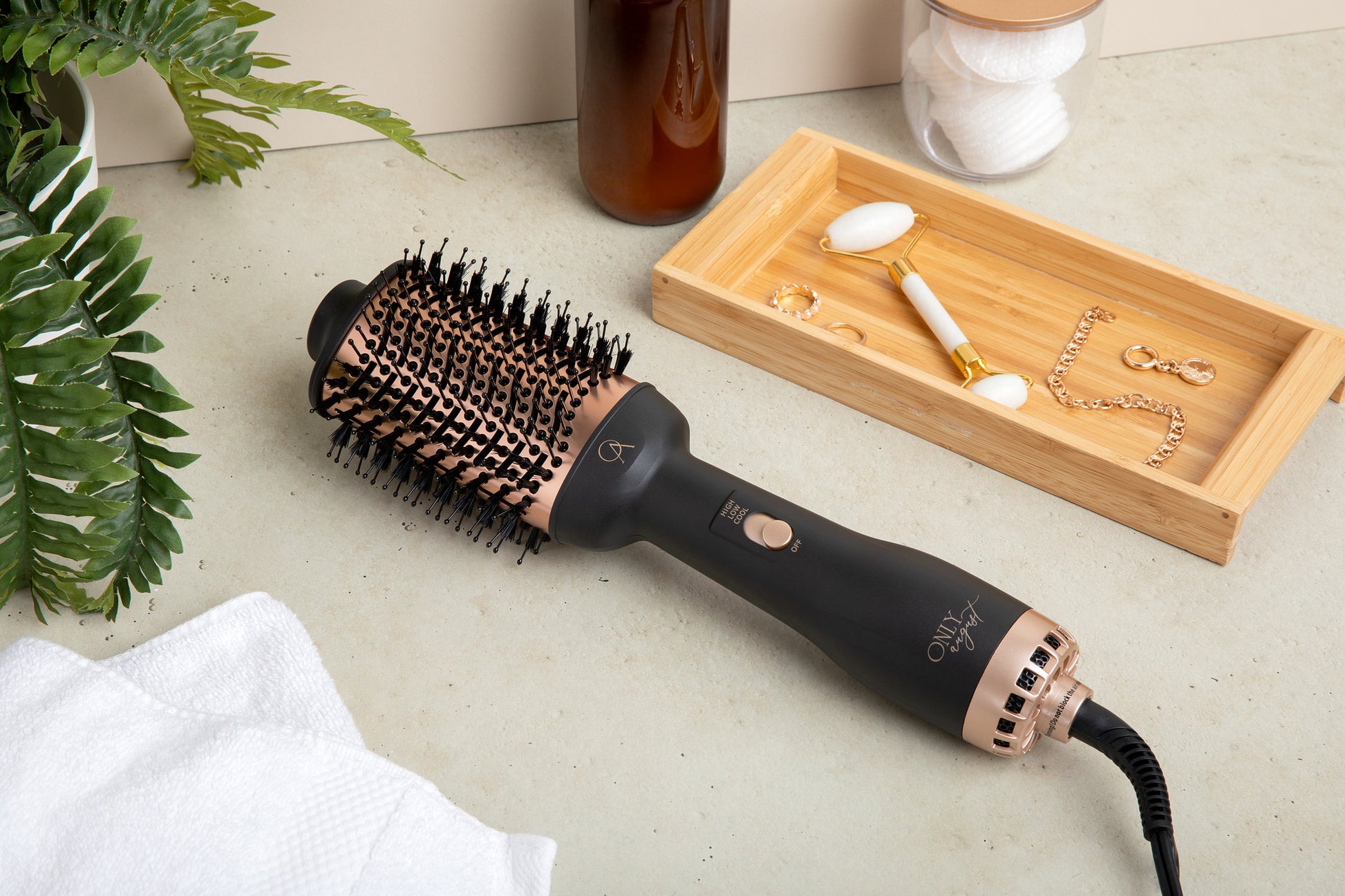 Only August 4-in-1 Hot Air Brush Black and Gold — lifestyle styling in use